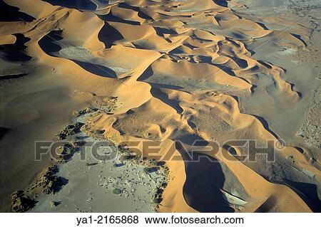 Aerial view of Namib-Naukluft NP desert near Sossusvlei, Namibia, Africa. View Large Photo Image Stock Photo - Aerial view of Namib-Naukluft NP desert near Sossusvlei, Namibia, Africa.. Fotosearch