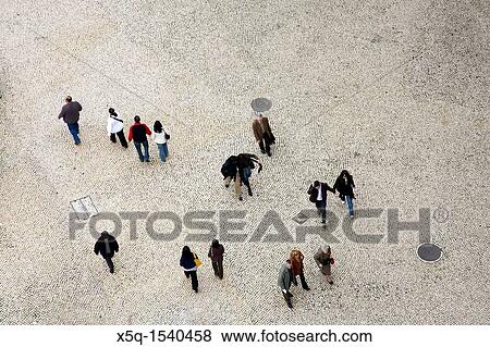 Aerial view of people walking on Restauradores square, Lisbon View Large Photo Image Stock Photo - Aerial view of people walking on Restauradores square, Lisbon. Fotosearch