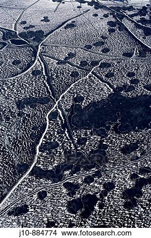 Aerial view of pond ice fractures, Lincoln, Rhode Island, USA View Large Photo Image Picture - Aerial view of pond ice fractures, Lincoln, Rhode Island, USA. Fotosearch