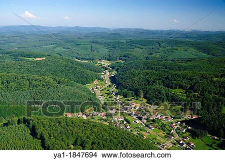 Picture - Aerial view of Reyersviller village in valley, Natural regional park of Northern Vosges, Moselle, Lorraine, France. Fotosearch