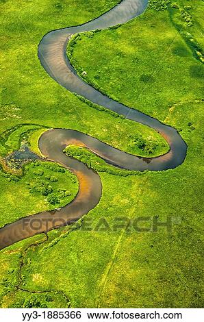 Aerial view of the meandering Pere Marquette River near its mouth, Michigan, USA View Large Photo Image Stock Photograph - Aerial view of the meandering Pere Marquette River near its mouth, Michigan, USA. Fotosearch