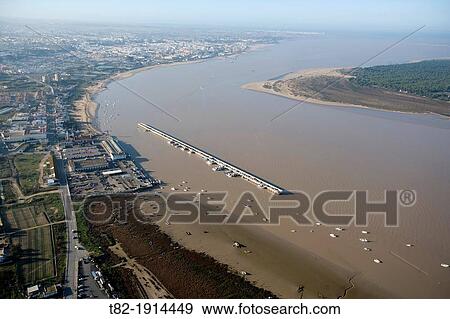 aerial view of the river Guadalquivir and the Port of Bonanza, Sanlucar de Barrameda, Cadiz, Doana Natural Park, Spain, Europe View Large Photo Image Stock Photo - aerial view of the river Guadalquivir and the Port of Bonanza, Sanlucar de Barrameda, Cadiz, Doana Natural Park, Spain, Europe. Fotosearch