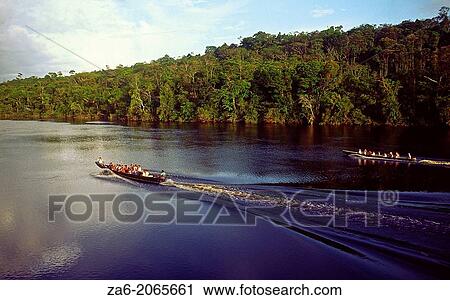 Aerial view of tourist boats going up Carrao river. Canaima National Park, Bolivar State, Southern Venezuela. View Large Photo Image Stock Image - Aerial view of tourist boats going up Carrao river. Canaima National Park, Bolivar State, Southern Venezuela.. Fotosearch