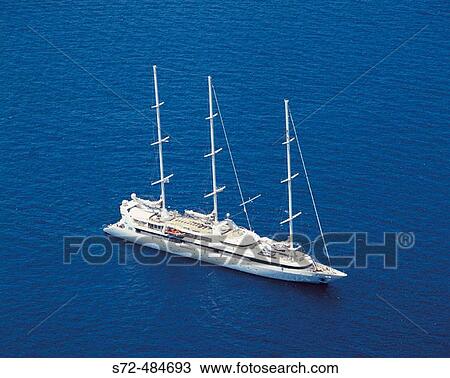 aerial view, sailboat near Santorini island, Cyclades, Greece View Large Photo Image Stock Image - aerial view, sailboat near Santorini island, Cyclades, Greece. Fotosearch