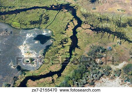 Aerial views from Camp Khwai River Lodge by Orient Express in Botswana View Large Photo Image Stock Image - Aerial views from Camp Khwai River Lodge by Orient Express in Botswana. Fotosearch