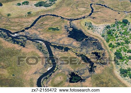 Aerial views from Camp Khwai River Lodge by Orient Express in Botswana View Large Photo Image Stock Image - Aerial views from Camp Khwai River Lodge by Orient Express in Botswana. Fotosearch
