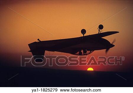 Aerobatic plane CR-100 flying at sunset, France View Large Photo Image Stock Photo - Aerobatic plane CR-100 flying at sunset, France. Fotosearch