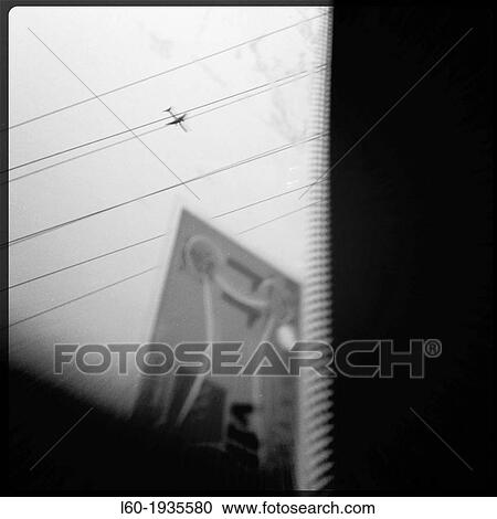 Aeroplane flying over power line, Barajas Airport in Madrid View Large Photo Image Stock Image - Aeroplane flying over power line, Barajas Airport in Madrid. Fotosearch