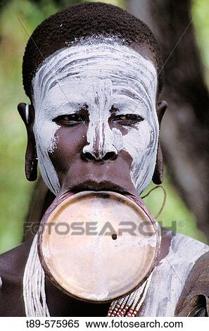 Stock Photography - Africa, Ethiopia, Murle Region, Surma Tribeswoman, Lip plate. Fotosearch