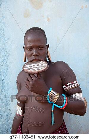 Stock Image - Africa Ethiopia Omo Valley Mursi people.. Fotosearch
