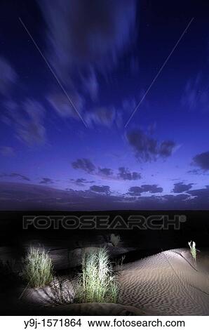 Africa, Tunisia, Tembaine Artificial floodlight illumination in the Sahara desert View Large Photo Image Picture - Africa, Tunisia, Tembaine Artificial floodlight illumination in the Sahara desert. Fotosearch