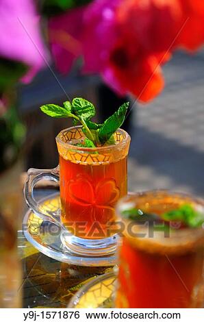 Africa, Tunisia, Tozeur Tea from fresh mint leaves View Large Photo Image Stock Photograph - Africa, Tunisia, Tozeur Tea from fresh mint leaves. Fotosearch