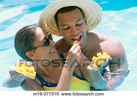 african amer couple in a swiming pool View Large Photo Image Stock Photo - african amer couple in a swiming pool. Fotosearch