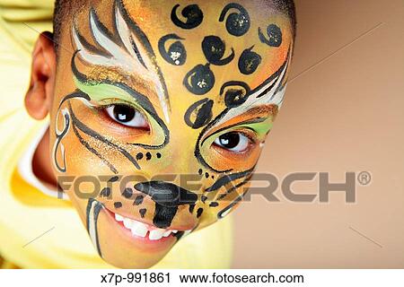 Stock Image - African American Boy with Face Paint. Fotosearch