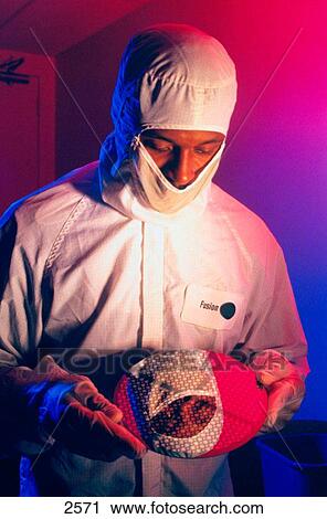African American male technician in clean room of computer chipmanufacturing plant View Large Photo Image Stock Image - African American male technician in clean room of computer chipmanufacturing plant. Fotosearch