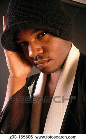 Stock Photograph - African-American Man portrait in hat. Fotosearch
