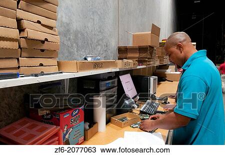 african american man shipping computer technology IT company shipping inventory. View Large Photo Image Stock Image - african american man shipping computer technology IT company shipping inventory.. Fotosearch