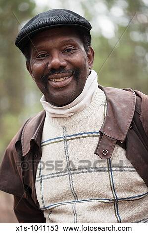 Stock Image - African American Poet contemplates the world around him. Fotosearch