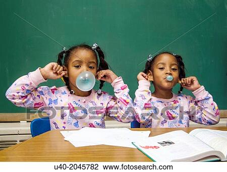 African American twins doing homework. View Large Photo Image Stock Image - African American twins doing homework.. Fotosearch