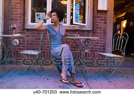 African American woman at outdoor cafe View Large Photo Image Stock Image - African American woman at outdoor cafe. Fotosearch