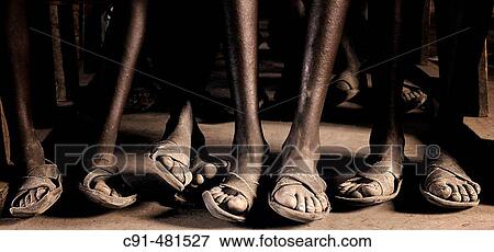 Stock Photo - African feet at school. Tanzania. Fotosearch