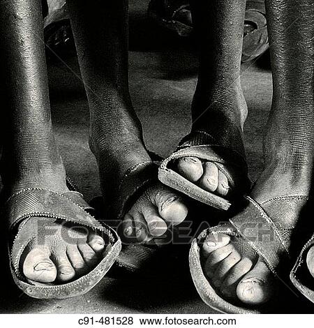 Stock Photo - African feet at school. Tanzania. Fotosearch
