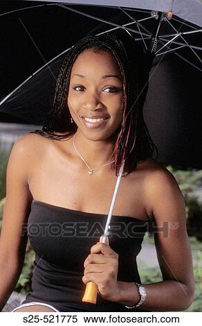 African Woman in Black Dress, City Environment, MR #1027 View Large Photo Image Stock Photography - African Woman in Black Dress, City Environment, MR #1027. Fotosearch