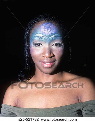 Stock Image - African Woman with Unique Face Painting, Parking Structure, Tustin, California, MR #1049. Fotosearch