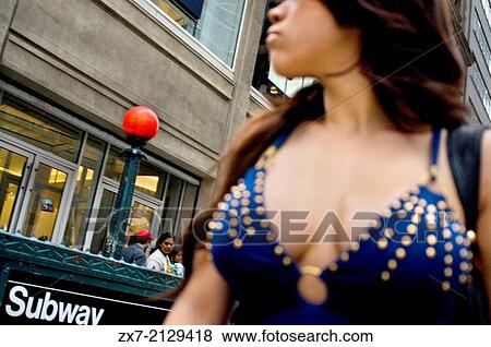 Stock Photo - After a period of decline and a center of prostitution, crime and drugs, this part of town has become an area of security, entertainment, commerce and restaurants, thanks to the draft Times Square Business Improvement District. . Fotosearch