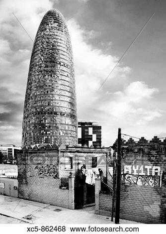 Agbar building prior to demolition of old buildings adjacent to it View Large Photo Image Stock Photo - Agbar building prior to demolition of old buildings adjacent to it. Fotosearch