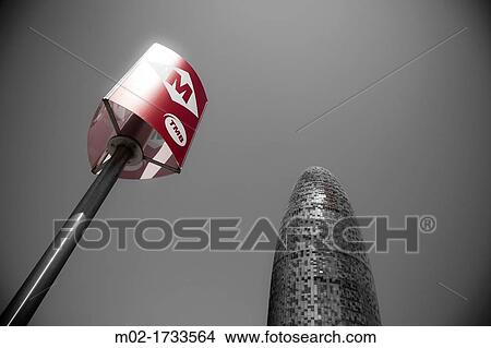 Picture - Agbar tower and metro sign in Barcelona, Catalonia, Spain. Fotosearch