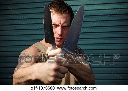 Aggressive 30 year old man with knife View Large Photo Image Stock Image - Aggressive 30 year old man with knife. Fotosearch