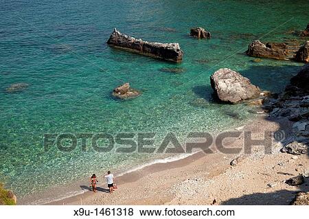 Agios Ioannis beach on the northern coast of Skopelos Island next to the church, Agios Ioannis sto Kastri, Skopelos Island, Northern Sporades, Greece View Large Photo Image Stock Photo - Agios Ioannis beach on the northern coast of Skopelos Island next to the church, Agios Ioannis sto Kastri, Skopelos Island, Northern Sporades, Greece. Fotosearch