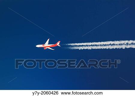 Air Berlin airplane brightly lit in a clear deep blue sky. View Large Photo Image Stock Photograph - Air Berlin airplane brightly lit in a clear deep blue sky.. Fotosearch