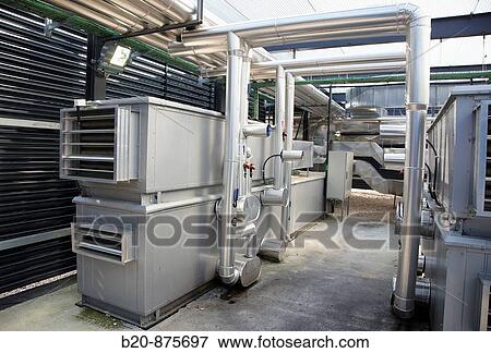 Stock Photo - Air-conditioning industrial installation on roof of building, Donostia, San Sebastian, Gipuzkoa, Basque Country, Spain. Fotosearch
