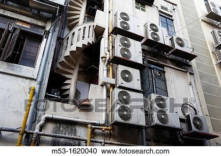 Air conditioning units outside a commercial building in Boat Quay Singapore View Large Photo Image Stock Image - Air conditioning units outside a commercial building in Boat Quay Singapore. Fotosearch
