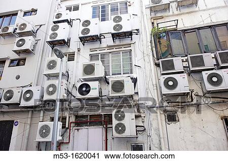 Air conditioning units outside a commercial building in Boat Quay Singapore View Large Photo Image Stock Image - Air conditioning units outside a commercial building in Boat Quay Singapore. Fotosearch