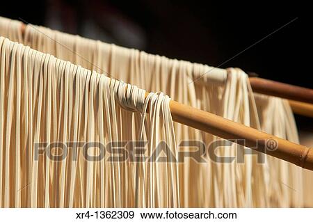 Air drying Noodles, Weishan, Dali Bai Autonomous Prefecture, Yunnan, China View Large Photo Image Stock Photo - Air drying Noodles, Weishan, Dali Bai Autonomous Prefecture, Yunnan, China. Fotosearch
