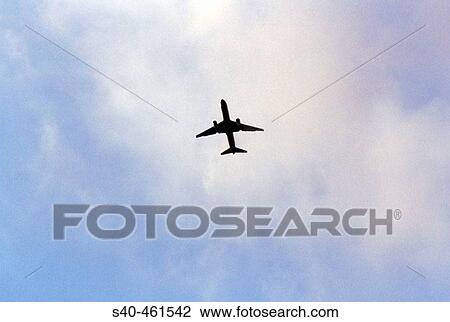 Stock Image - Airplane, sky, clouds. Fotosearch