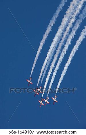 Stock Photo - Airshow of the Patrulla Aguila from Spanish Air Force, Festa al Cel 2011, Barcelona, Spain. Fotosearch