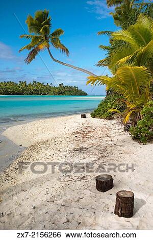 Stock Photograph - Aitutaki. Cook Island. Polynesia. South Pacific Ocean. Beach in One Foot Island.. Fotosearch