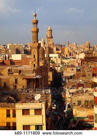 Stock Photo - Al Mu? izz historic street & city view. Cairo, Egypt. Fotosearch