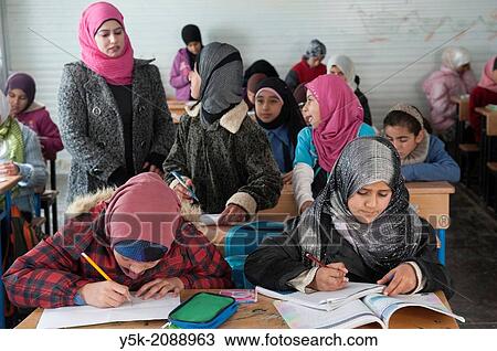 Al Za? atari, Al Mafraq region, Jordan, Middle-East. UNICEF provides primary education in the Jordan refugee camp Al Za? atari. View Large Photo Image Stock Image - Al Za? atari, Al Mafraq region, Jordan, Middle-East. UNICEF provides primary education in the Jordan refugee camp Al Za? atari.. Fotosearch