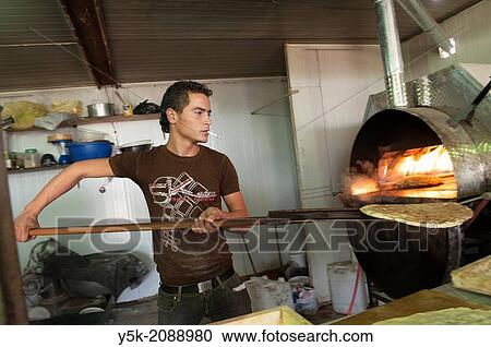 Stock Image - Al Za? atari, Al Mafraq region, Jordan, Middle-East. Main street in the UNHCR refugee camp Al Za? atari, called:? Shams-Elysees?. Fotosearch