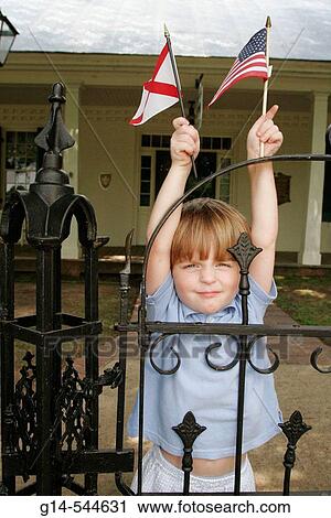 Alabama, Florence, Pope's Tavern Museum, 18th century stagecoach stop, boy, flags, View Large Photo Image Stock Image - Alabama, Florence, Pope's Tavern Museum, 18th century stagecoach stop, boy, flags,. Fotosearch