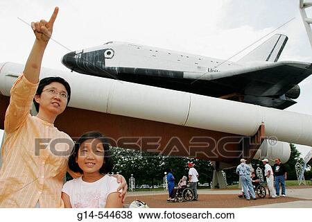 Stock Photo - Alabama, Huntsville, US Space and Rocket Center, Space Camp, Asian mother, daughter, girl,. Fotosearch