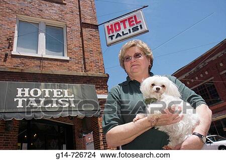 Alabama, Tallasee, Hotel Talisi, woman, senior, dog, Maltese, white, toy breed, historic downtown, View Large Photo Image Picture - Alabama, Tallasee, Hotel Talisi, woman, senior, dog, Maltese, white, toy breed, historic downtown,. Fotosearch