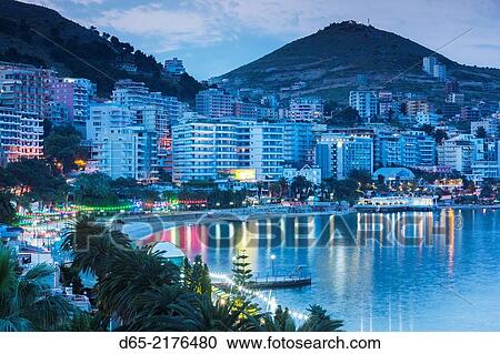 Albania, Albanian Riviera, Saranda, hotels along the Ionian Sea, dawn. View Large Photo Image Stock Image - Albania, Albanian Riviera, Saranda, hotels along the Ionian Sea, dawn.. Fotosearch