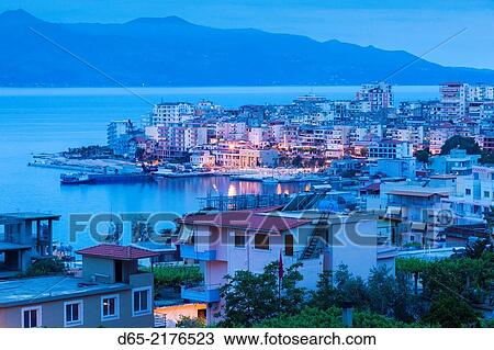 Albania, Albanian Riviera, Saranda, elevated city view, dawn. View Large Photo Image Stock Image - Albania, Albanian Riviera, Saranda, elevated city view, dawn.. Fotosearch