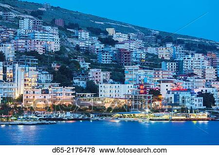 Albania, Albanian Riviera, Saranda, hotels along the Ionian Sea, dusk. View Large Photo Image Stock Photo - Albania, Albanian Riviera, Saranda, hotels along the Ionian Sea, dusk.. Fotosearch